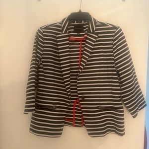 Christian Soriano white and black striped blazer.